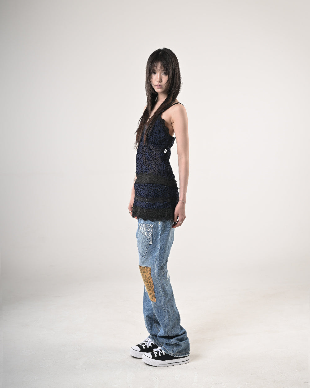 11 PATCHED DENIM PANTS